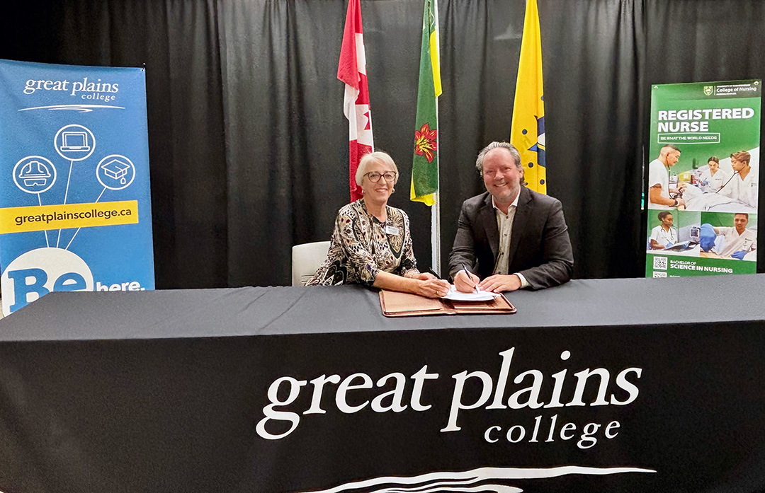 (L to R) University of Saskatchewan College of Nursing Dean Dr. Solina Richter (DCur), and President and CEO of Great Plains College Brad Mahon, at the official signing event in Swift Current, July 4, 2024. (credit: Breanna Pochipinski)